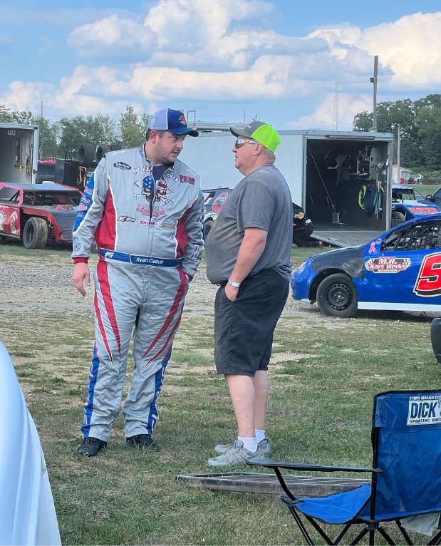 Driver wearing a FervoGear custom race suit
