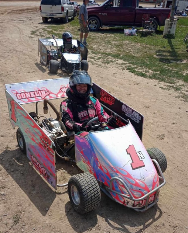 Driver wearing a FervoGear custom race suit